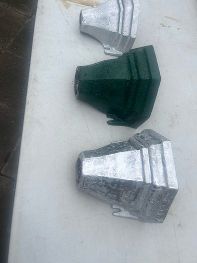 3 water hoppers converted to plant holders. With drainage