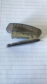 Compact SDI S-3 Mini Stapler Translucent smoke-grey body with sturdy metal stapling mechanism and built-in staple remover. In great working condition, lightweight, and perfect for home, office, or school pencil cases!