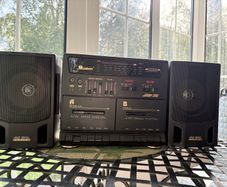 Radio and double cassette machine with speakers