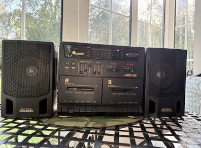 Radio and double cassette machine with speakers