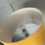 Floor lamp with yellow  drum shade Image 2
