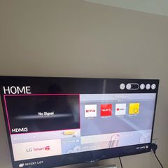 LG 40" Ultra HD + Wall-bracket (New in box)