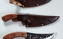 2 Kitchen Knives With Sheaths (new).