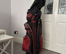 Wilson Golf bag , with rain cover and umbrella holder , has loads of pockets for storage