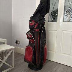 Wilson Golf bag , with rain cover and umbrella holder , has loads of pockets for storage