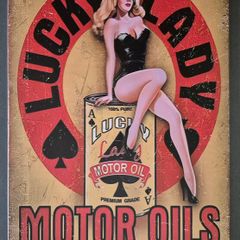 Vintage Style Metal Sign. Lucky lady motor oil.