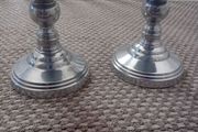 pair of metal pillar candle holders