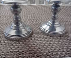 pair of metal pillar candle holders