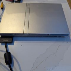Sony PlayStation 2 slim plus extras