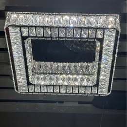 Crystal Chandelier with stainless steel and mirrored finish. 3 colour options. Remote Control.