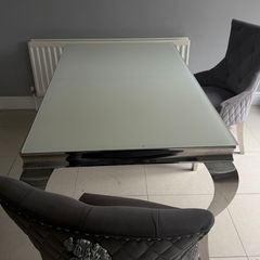 table and 2 plush velvet knocker chairs