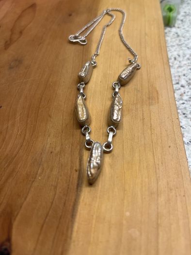 silver neck item