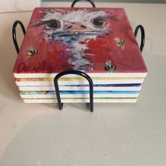 Set of five ceramic tile animal coasters with holder