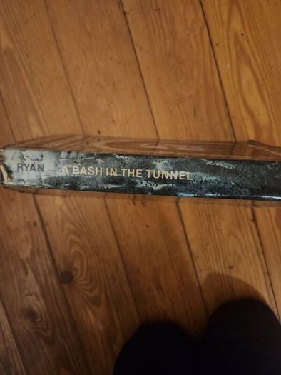A Bash In The Tunnel. Edited By John Ryan. First Edition Hardback With Dustjacket In Good Condition.