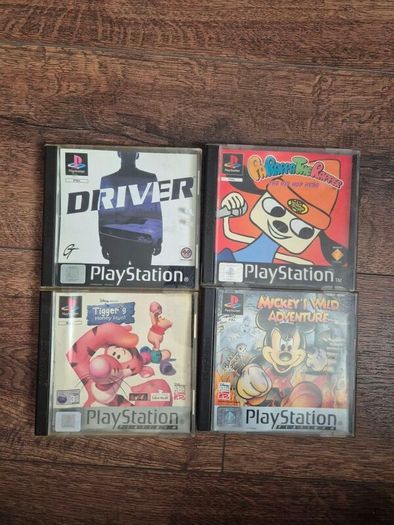 playstation 1 console with controller