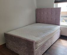 Pink double bed with mattress