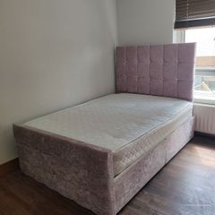 Pink double bed with mattress