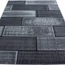 Modern Rug stone wall design living room Image 3