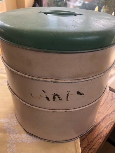 selection of vintage cake storage tins with lids