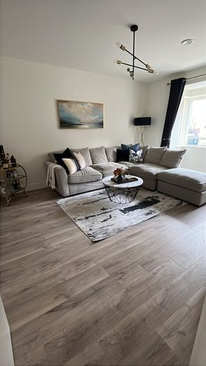 Comfortable L- shaped grey sofa