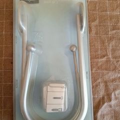LBB metal J-shaped curtain holdbacks in a brushed chrome finish