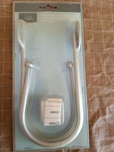 LBB metal J-shaped curtain holdbacks in a brushed chrome finish