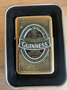 Guinness branded zippo style lighter w Casing