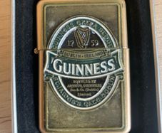 Guinness branded zippo style lighter w Casing