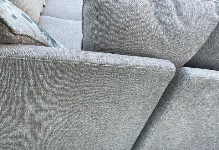 Beige L shaped corner sofa
