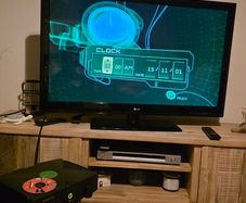 Original Xbox, 2 controllers, DVD remote & Receiver kit + Microphone attachment. Tested & Working