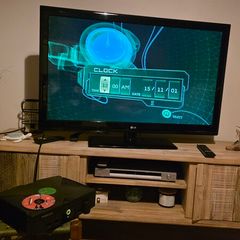 Original Xbox, 2 controllers, DVD remote & Receiver kit + Microphone attachment. Tested & Working
