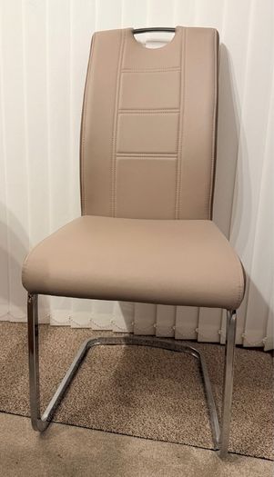 A set of 6 Dining room leather chairs with chrome frames