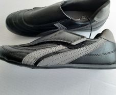 new black trainers/shoes tag attached