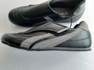 new black trainers/shoes tag attached