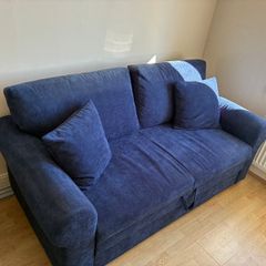 Blue corduroy sofa bed