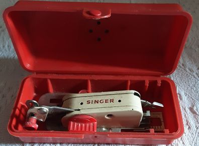 vintage singer sewing machine attachment