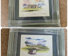 2 matching framed golf prints