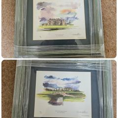2 matching framed golf prints