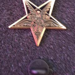 Pagan ,  pin back badge.