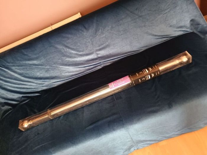 White metal chrome eylet curtain pole extendable