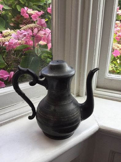 Vintage tea pot and antique candle stick