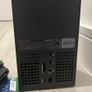 xbox series X with original controller and Jurassic World evolution two and halo infinity Image 4