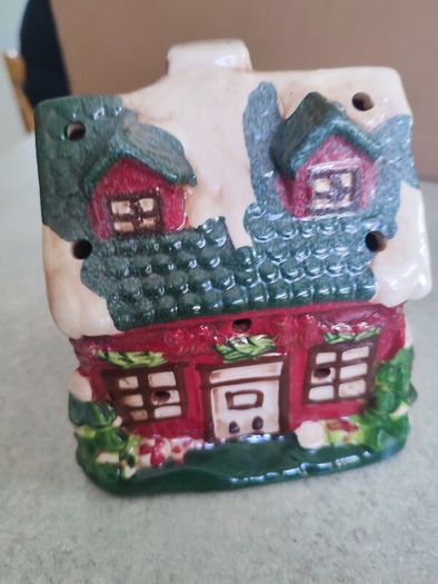 Vintage winter cottage battery candle.