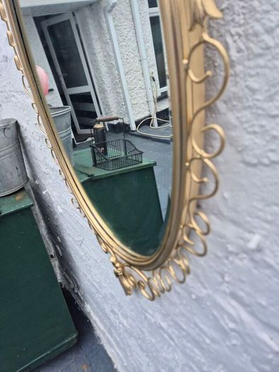 A Mirror Large heavy Vintage Rococo design filly bevelled oval Mirror