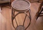 Rattan plant stand.
