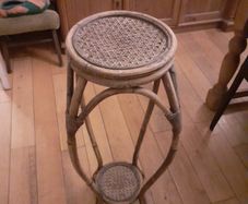 Rattan plant stand.