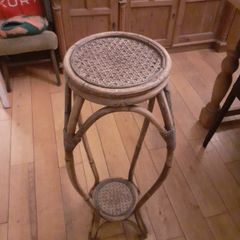 Rattan plant stand.