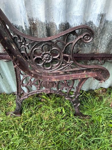 Pair of decorative cast iron bench ends
