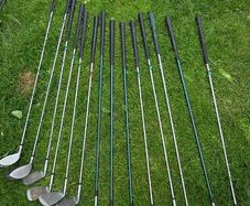 selection of golf clubs.