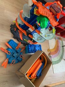 Collection of Hot Wheels track sets and accessories
